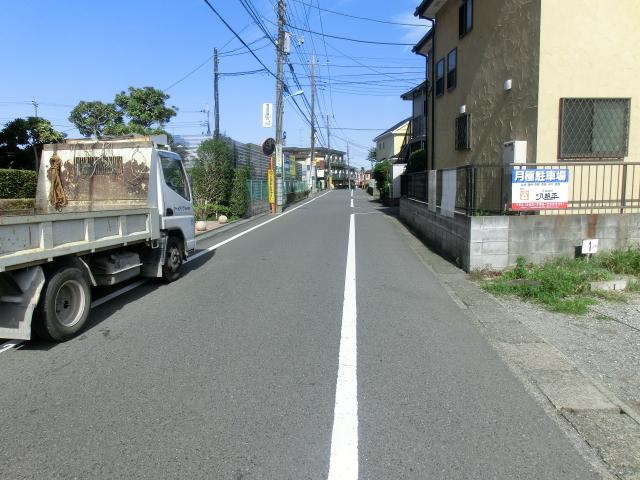 Local photos, including front road. 1 Building