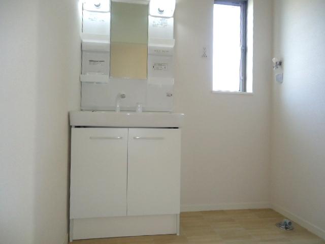 Wash basin, toilet. A Building bathroom