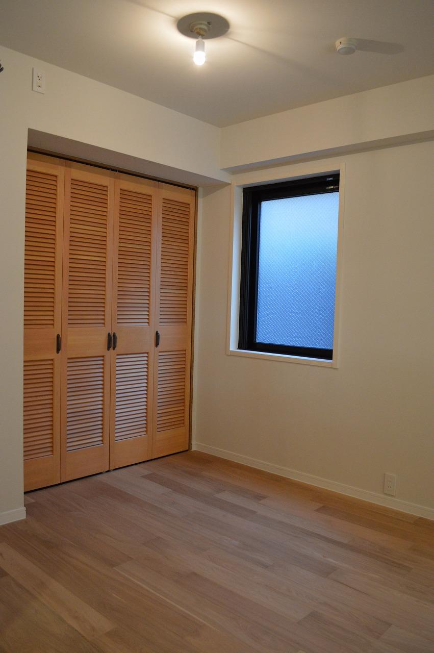 Non-living room. The closet of louver doors enhance the room the entire goods room2