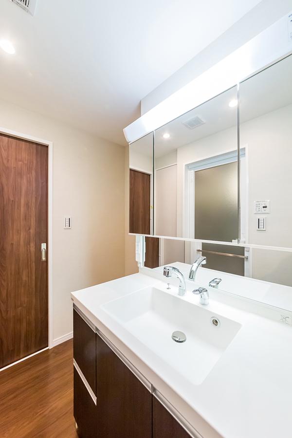 Wash basin, toilet. Vanity also replaced with new