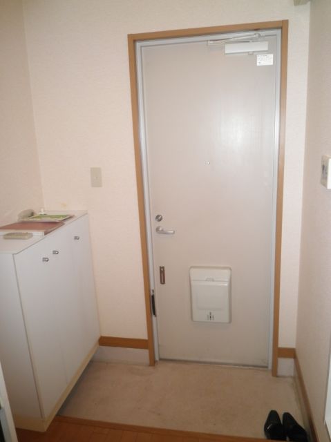 Entrance. With cupboard