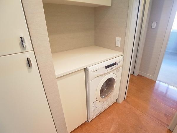 Wash basin, toilet. With washing and drying machine