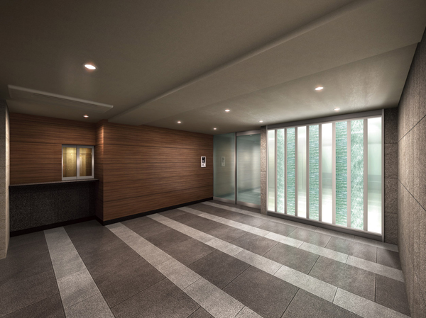 Features of the building.  [Entrance Hall Rendering] Floors and natural stone wall of the large-format tile, Connection from the outside to the inside, Entrance approach that invites people. In front of the hall, By such as glass sandwiching a laminated glass and Japanese paper, We designed a light wall that gives off an impressive and cool shine.