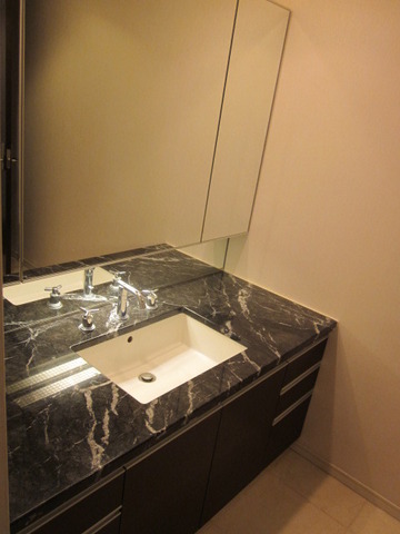 Washroom. Three-sided mirror separate vanity