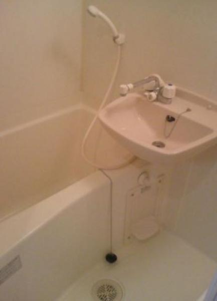 Wash basin, toilet. Another dwelling unit photo