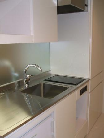 Kitchen. Kitchen is equipped with a convenient disposer
