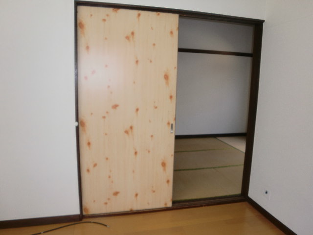 Other room space. Sliding door of Western and Japanese-style