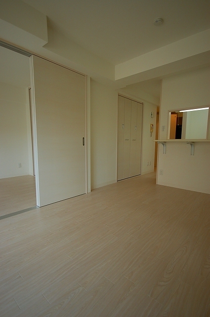 Living and room. It is a bright room with pre-renovation. 