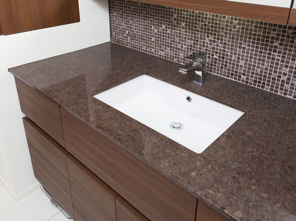Bathing-wash room.  [Counter top (top panel)] High durability, It has adopted the artificial marble that contains easy to quartz-based crystal of excellent care in design.