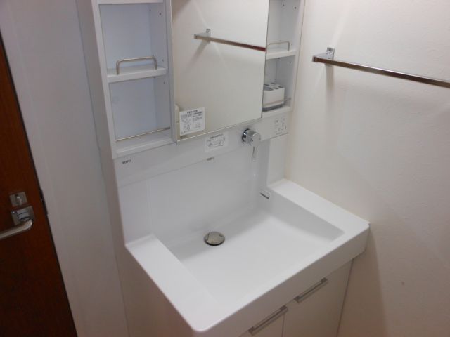 Washroom. Pretty washbasin with a convenient anti-fog function