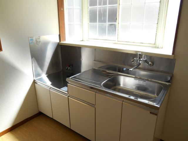 Kitchen. You can put two-burner gas stove, Bright kitchen is equipped with a window