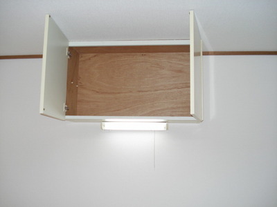 Other room space. Hanging cupboard in the kitchen