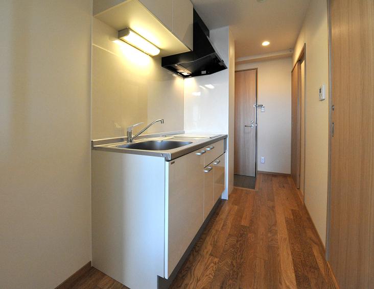 Kitchen. It is a photograph of the same type 605, Room.