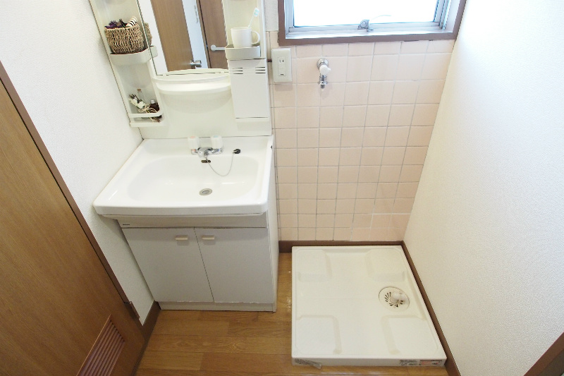 Washroom. In bright undressing room, Independent wash basin also family size