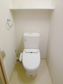 Toilet. The same type separate room reference photograph [Cleaning function with toilet seat]