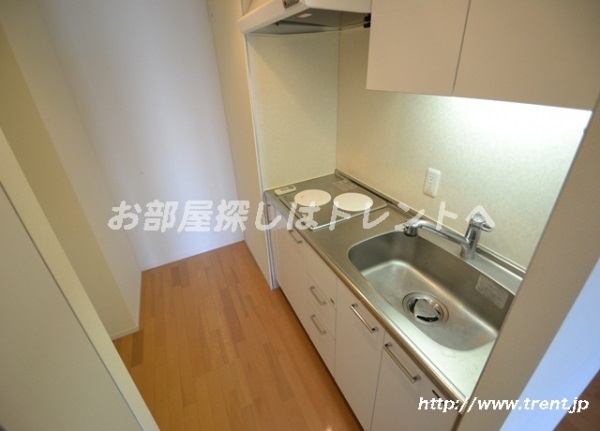 Kitchen. It is a reference photograph of 1R type of the 24th floor of the same building.