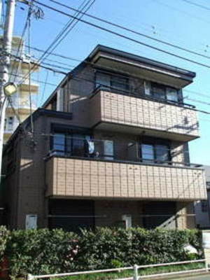 Building appearance. Mansion with a station near the auto lock