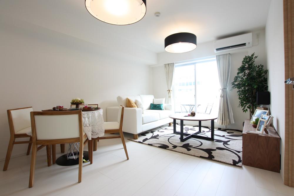 Living. top floor, Facing south. Model room published in