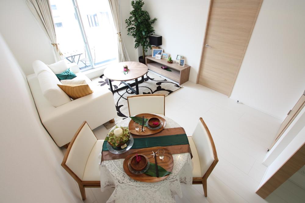 Living. top floor, Facing south. Model room published in