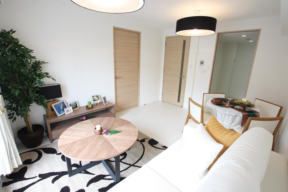 Living. top floor, Facing south. Model room published in