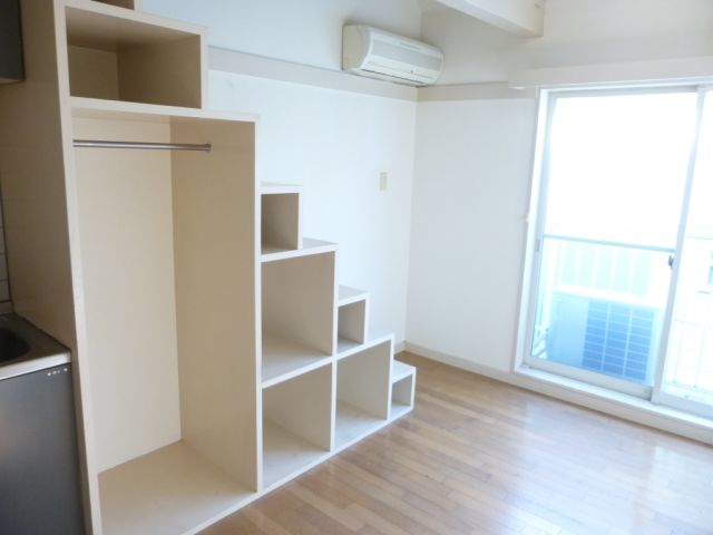 Living and room. Stylish stairs storage
