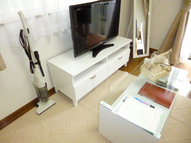 Living and room. 32-inch with a TV. It comes with a stylish furniture