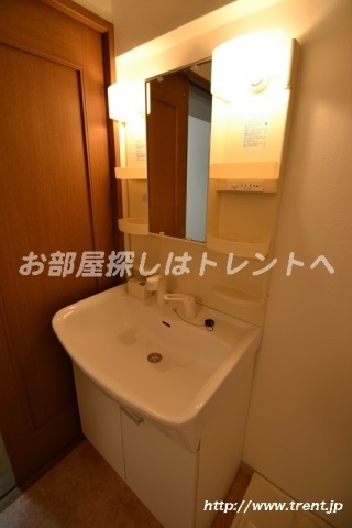 Washroom. Same building is a picture of the first floor 1LDK.