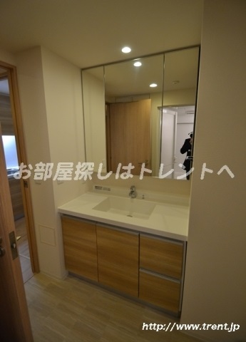 Washroom. It is a reference photograph of the same building 1LDK.