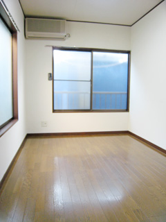 Other room space. It is a photograph of the 203 in Room. 