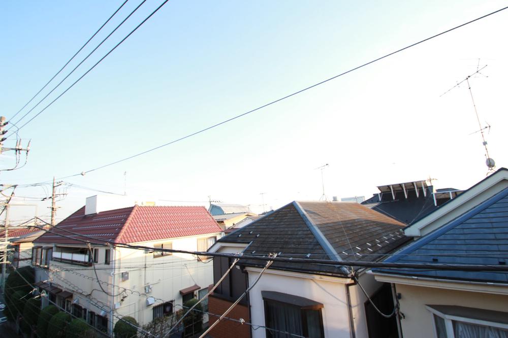 View photos from the dwelling unit. It is overlooking the spacious blue sky from the balcony