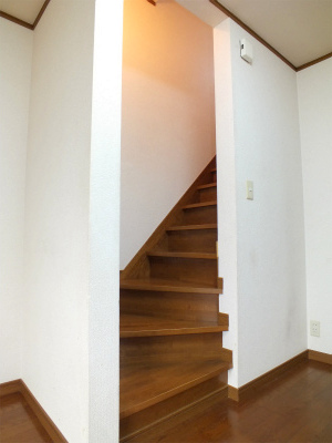 Other room space. Staircase that leads from the dining