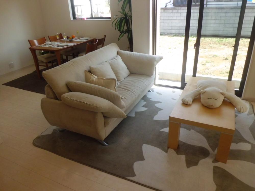 Living. The photograph is an image.