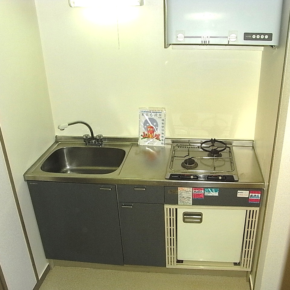 Kitchen. Two-burner gas stove with system Kitchen & mini-fridge