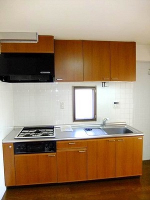 Kitchen. Kitchen with a window, 3-burner stove in the kitchen