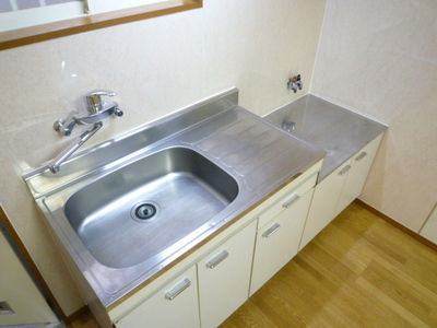 Kitchen. Two-burner gas stove installation Allowed (reference photograph of another in Room)