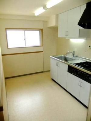 Kitchen. Large kitchen space with a window