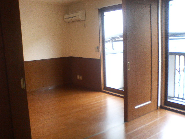 Other room space. It has come to be separated by a door.