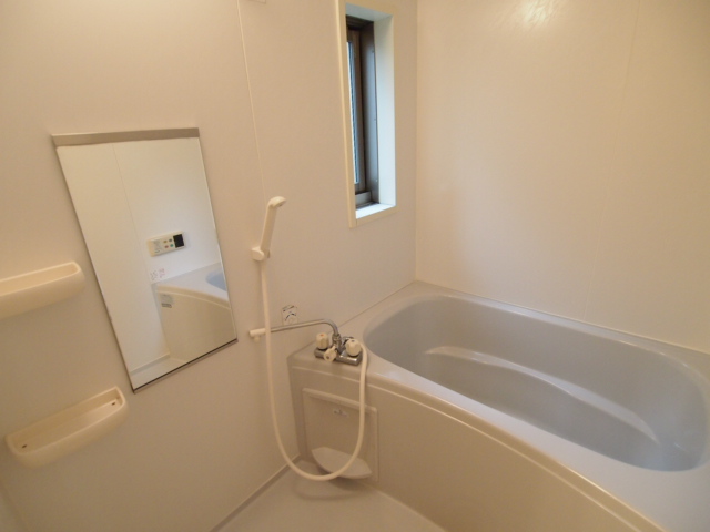Bath. Small window, mirror, With storage of large bath