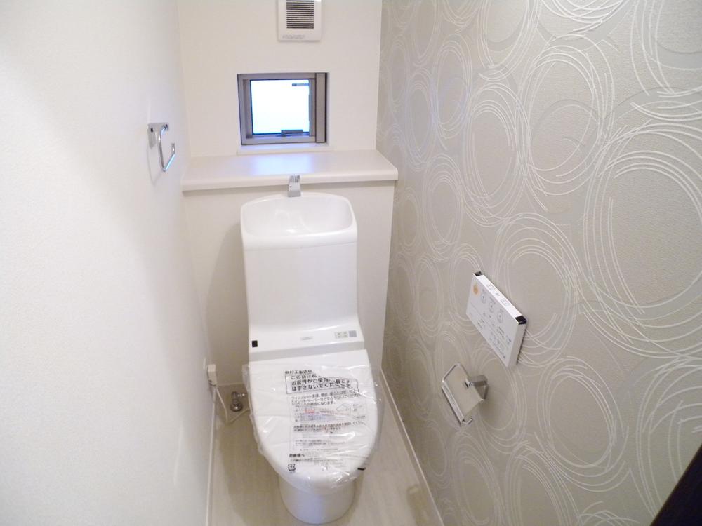 Toilet. Water-saving Washlet toilet