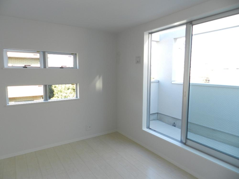 Non-living room. Western-style which leads to the north side of the roof balcony