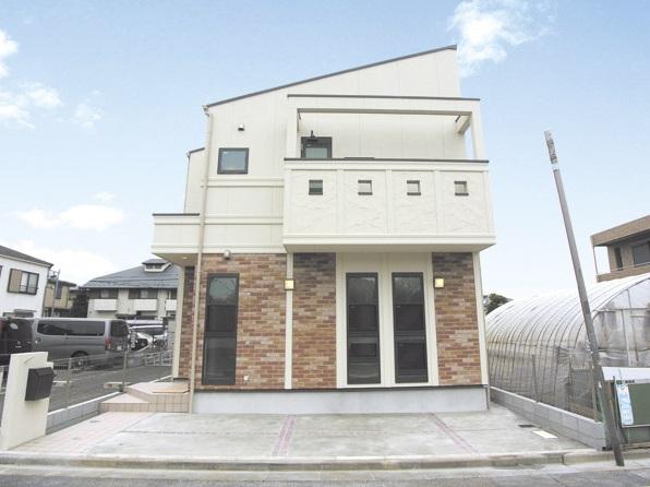 Local appearance photo. East parking lot, The west side is open at the production green space