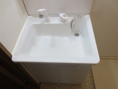 Washroom. With separate wash basin