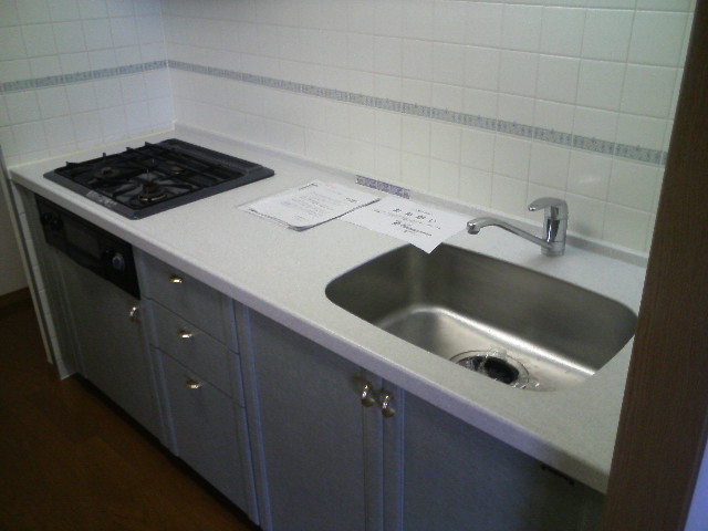 Kitchen. Kitchen top of marble. It drifts luxury. 