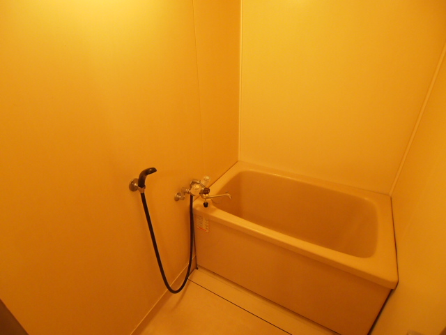 Bath. It is a bathroom with cleanliness.