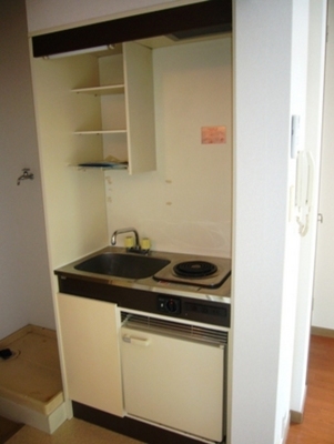 Kitchen. A kitchen with a mini fridge