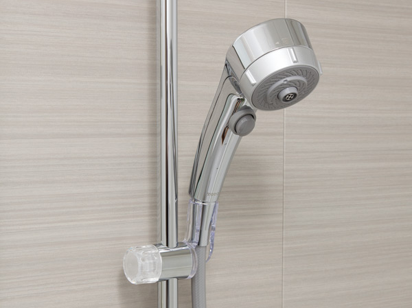 Bathing-wash room.  [Water-saving function shower head] Momentum of the water as it is, Shower head to reduce the runoff. It is water-saving type that can be stopped water at the click of a hand of a button.
