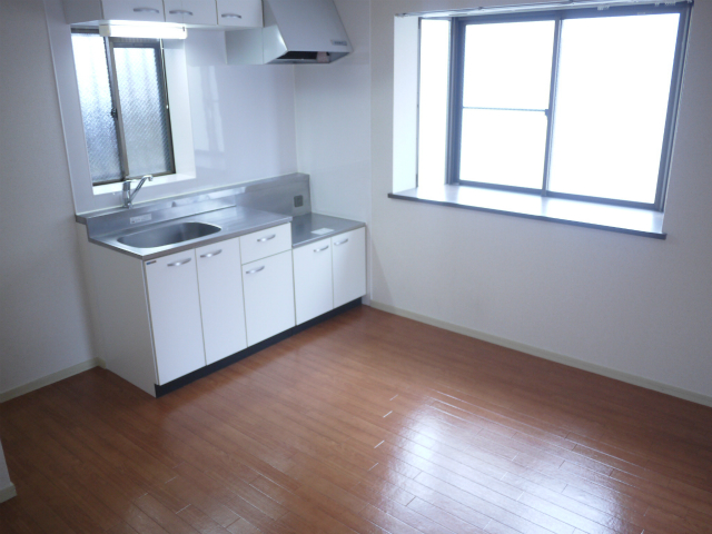 Living and room. Bright dining space! 