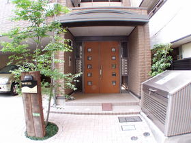 Entrance. Auto-lock on-site waste storage stylish entrance