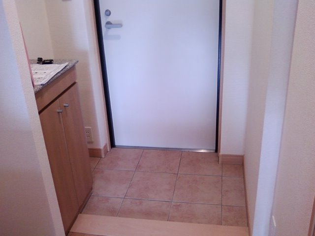 Entrance. With cupboard.