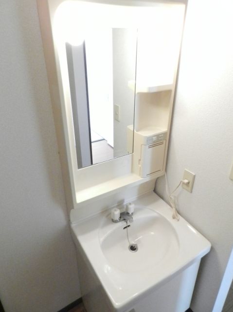 Washroom. With separate wash basin